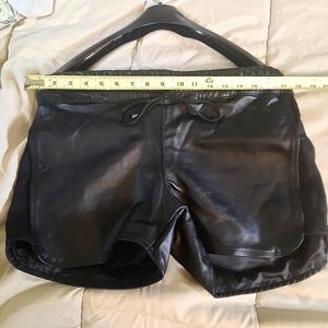 Black leather shorts brand new custom made satin lined.size med to large